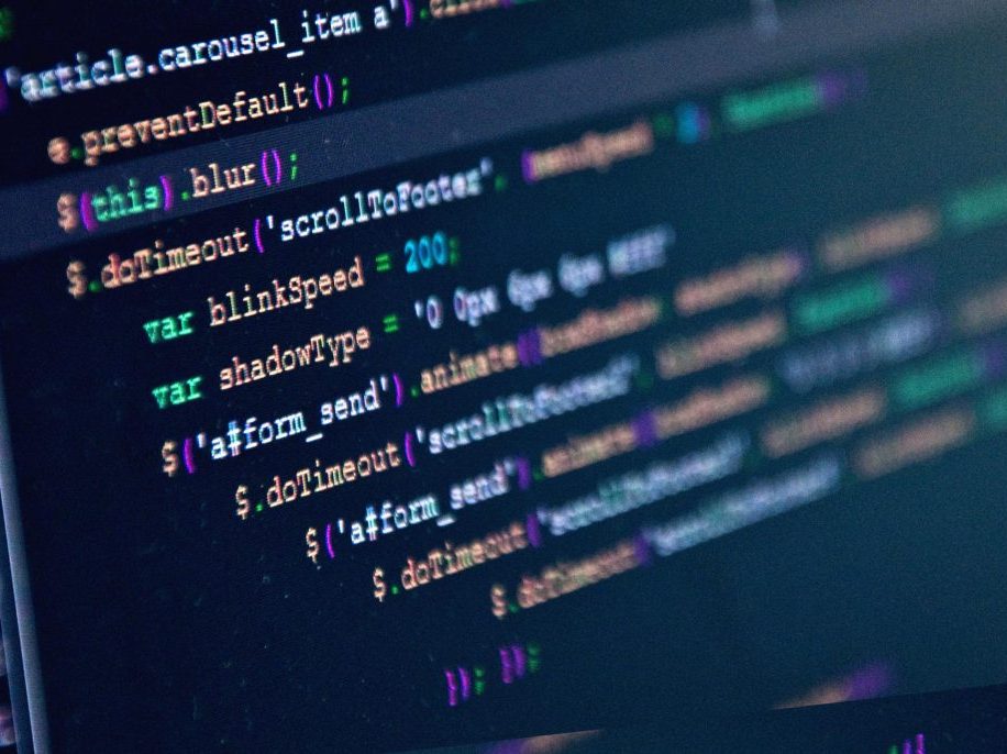 Program Screen with Lines of Code written across
