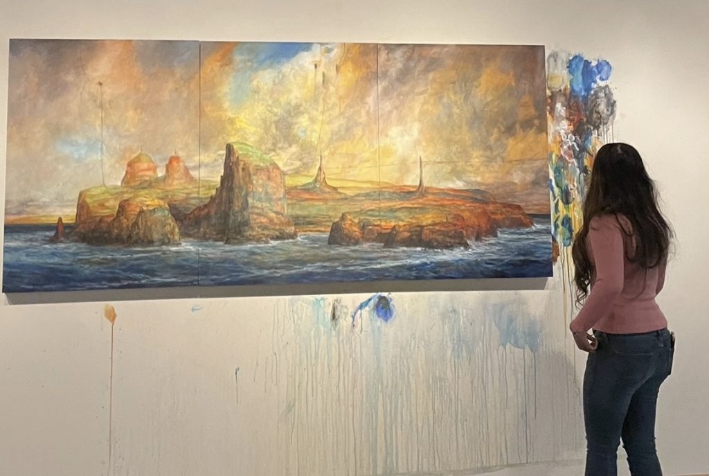 Me staring at the “Papahānaumoku: A Panoply of New Island Cultures — Works by Solomon Robert Nui Enos” at the Gordon Art Gallery Exhibit. (ft. my split ends)