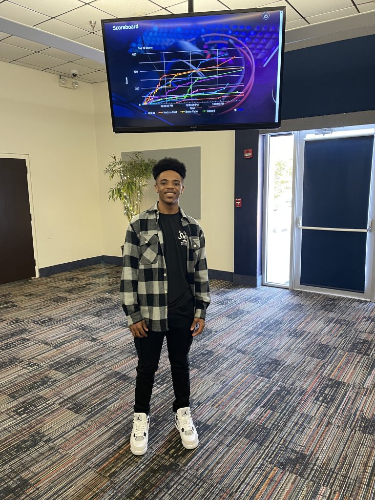 Image of Treyvien Kirk at the Cyber-Ops Conference event.